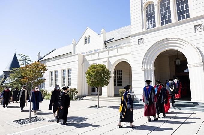 Graduate School of Theology students process into Stewart Chapel on the Marin Campus to take part in a Commencement ceremony on May 21. (Photo by Jamie Soja)